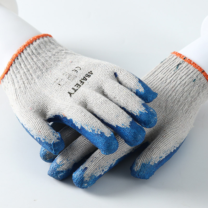                 White cotton with blue latex smooth coating gloves            