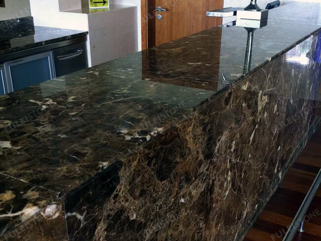 polished dark emperador marble reception desk